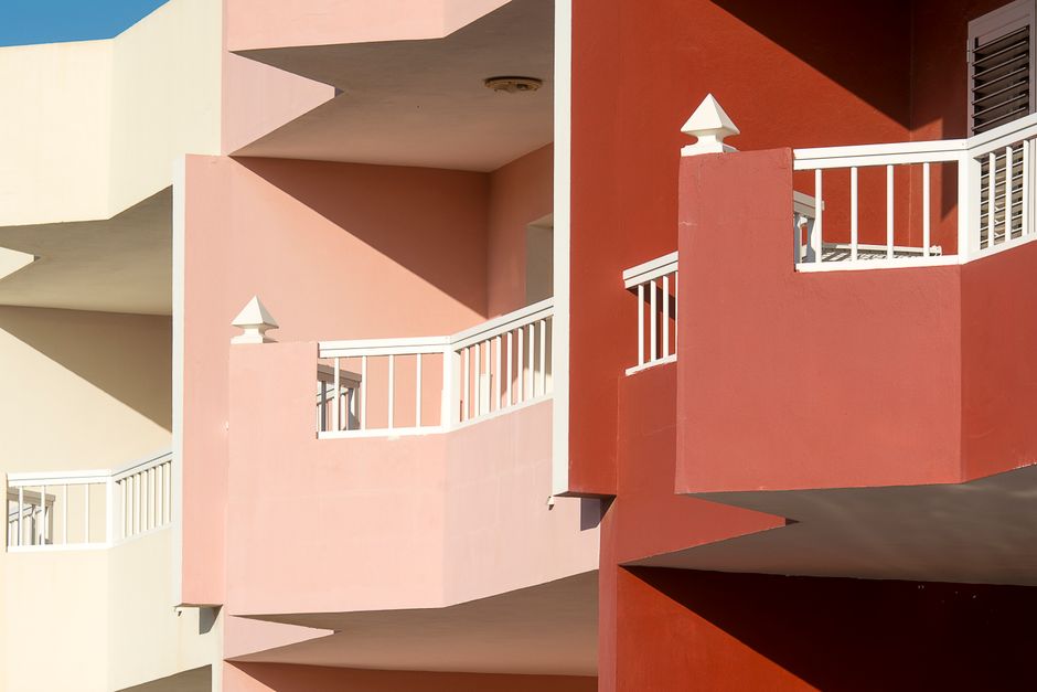 Painted balconies on the side of a building