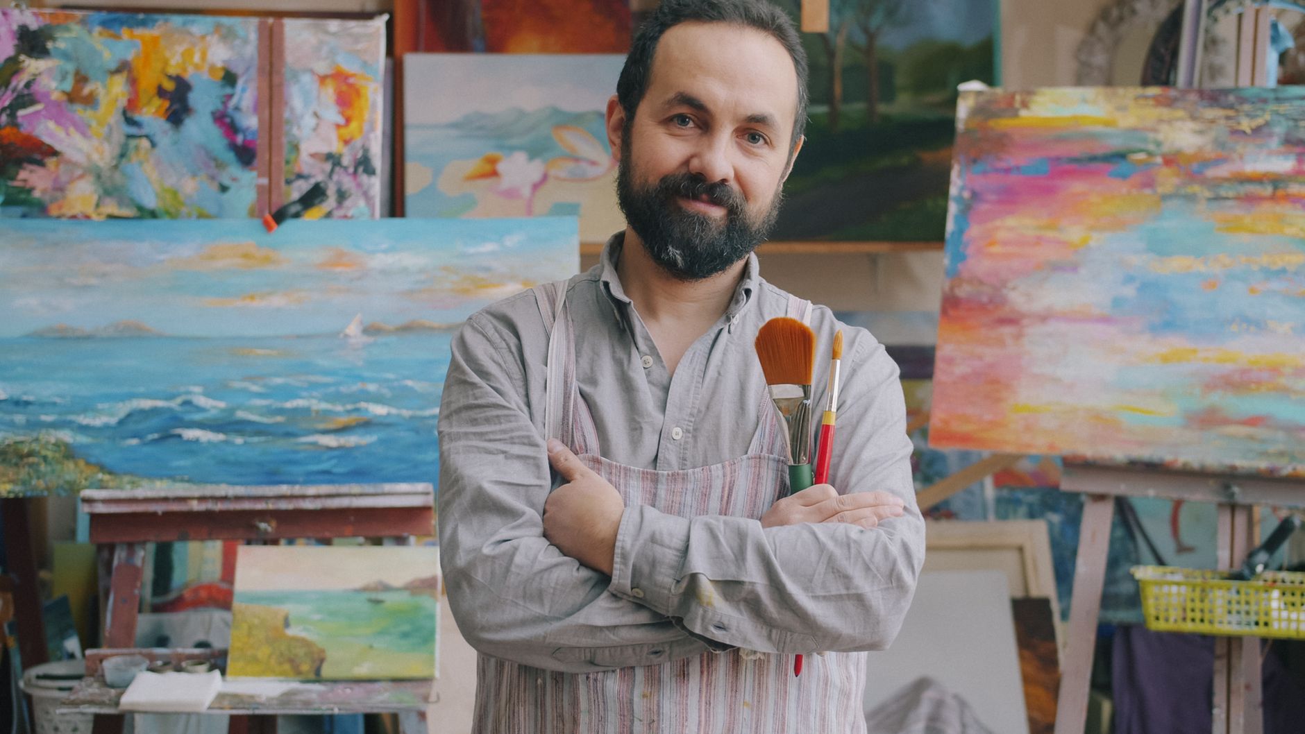 Paintbrushes and colourful paint